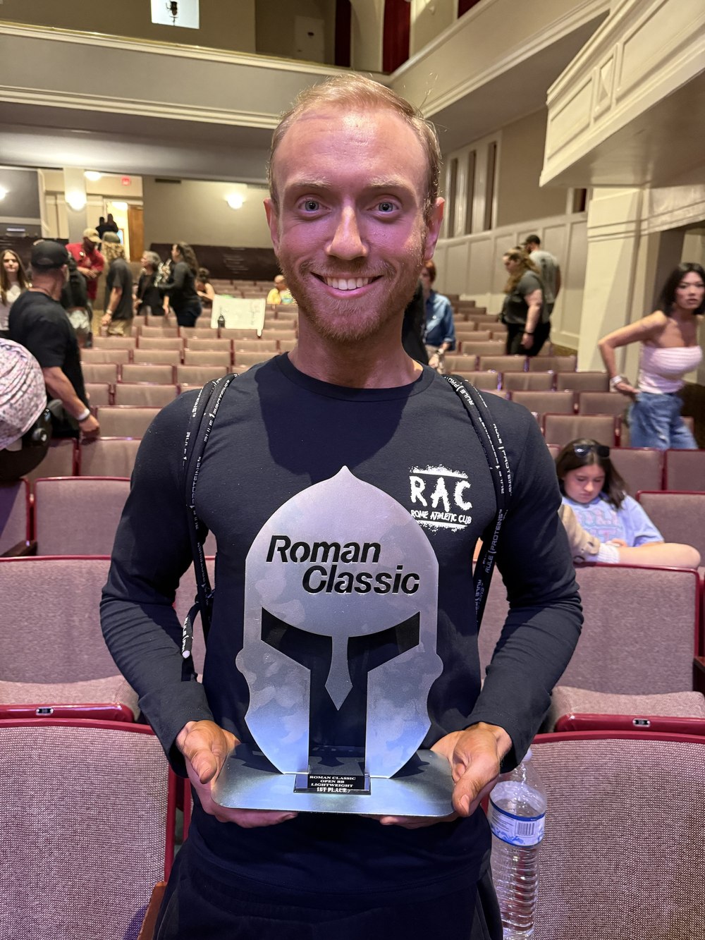 Dalton holding his first place trophy from the Roman Classic